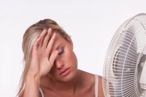 woman-with-electric-fan